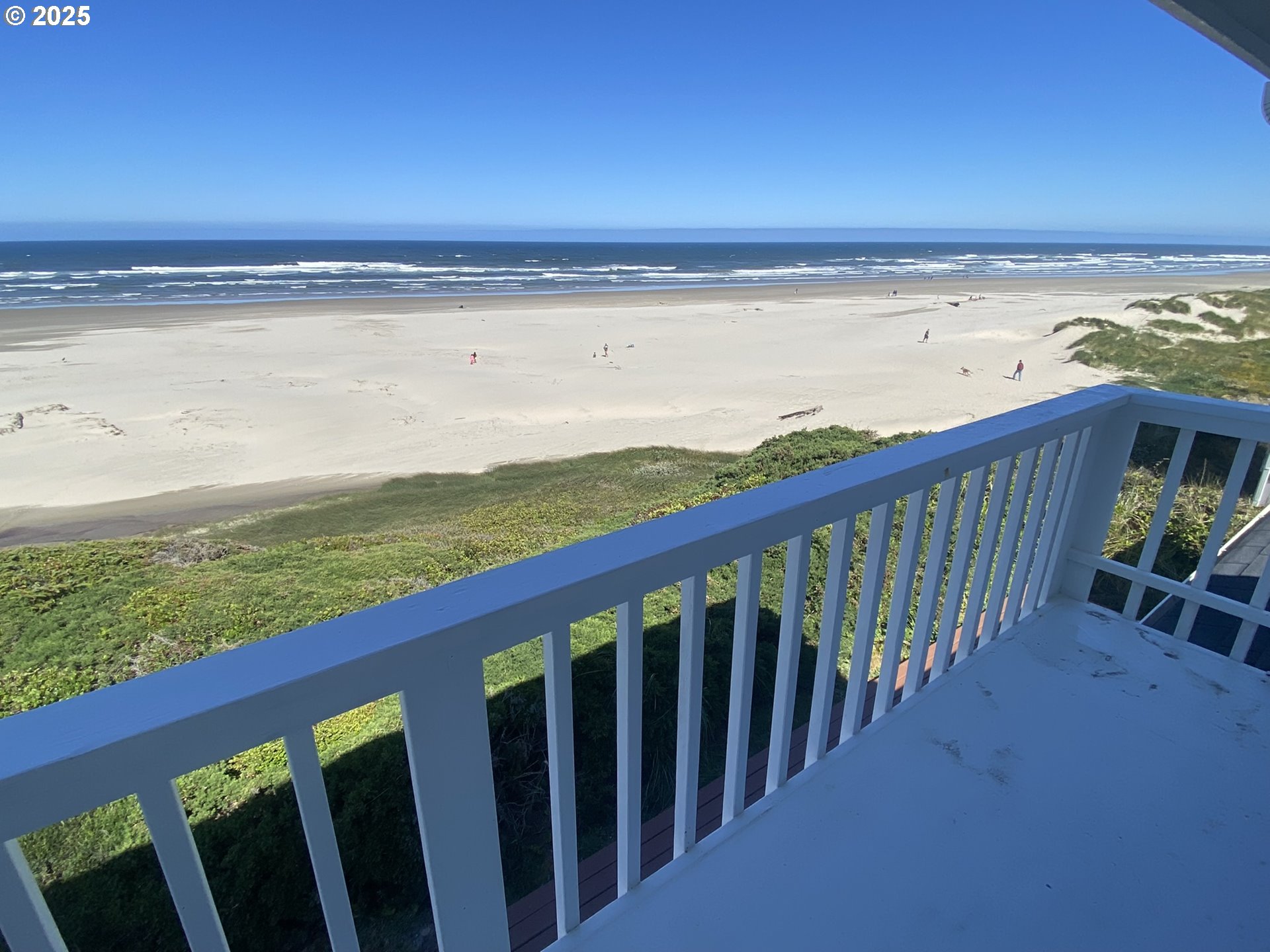4529 Lookout Street Florence, OR 97439 - Photo 4 of 46 a view of an ocean from a balcony
