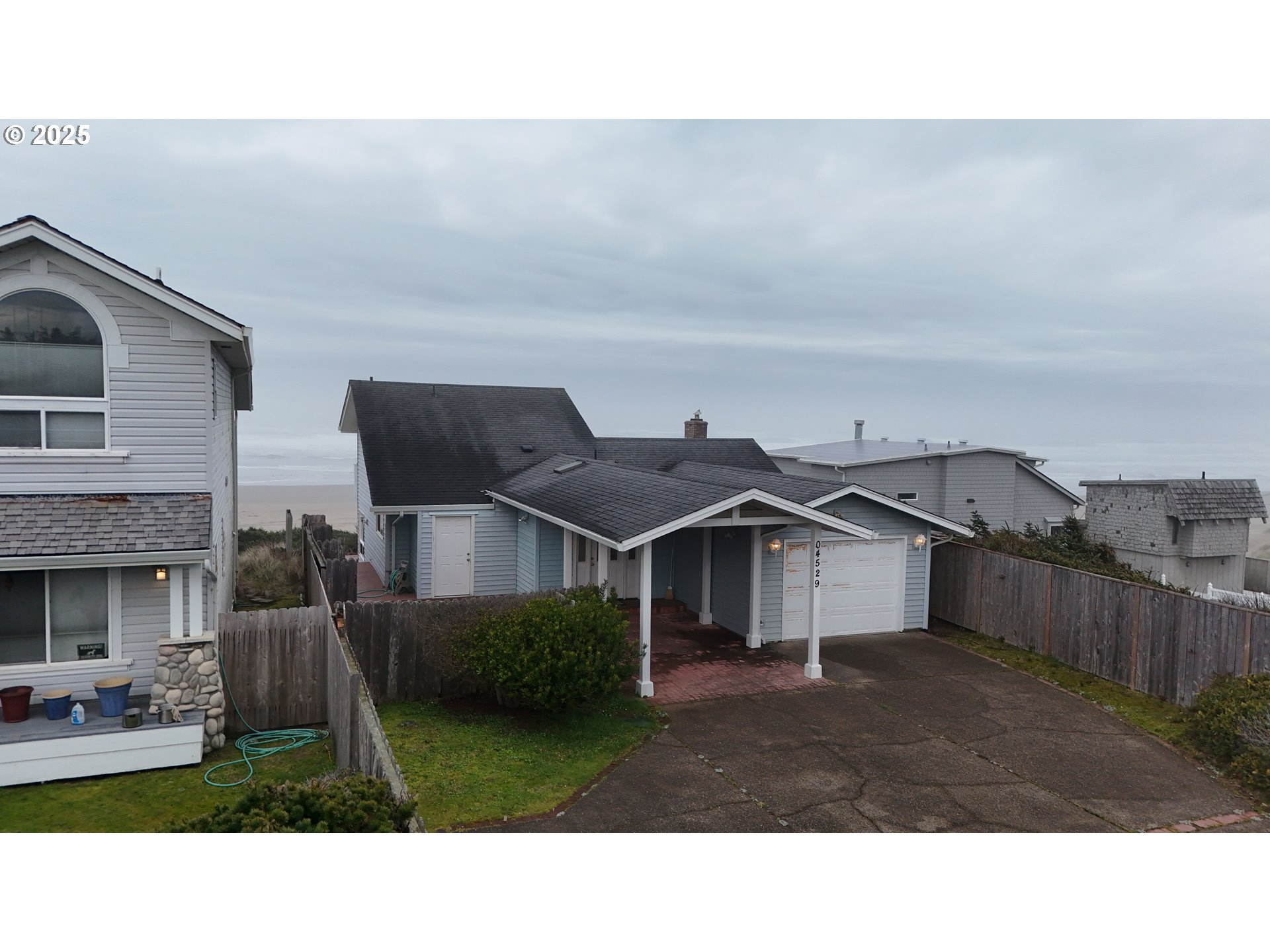 4529 Lookout Street Florence, OR 97439 - Photo 42 of 46 a black and white photo of a house