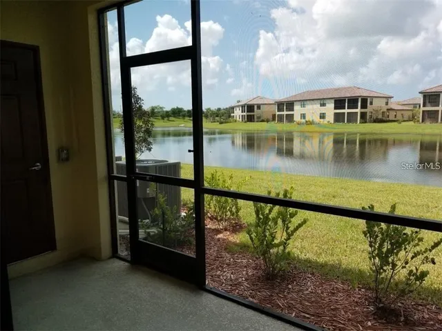 a view of swimming pool from a balcony