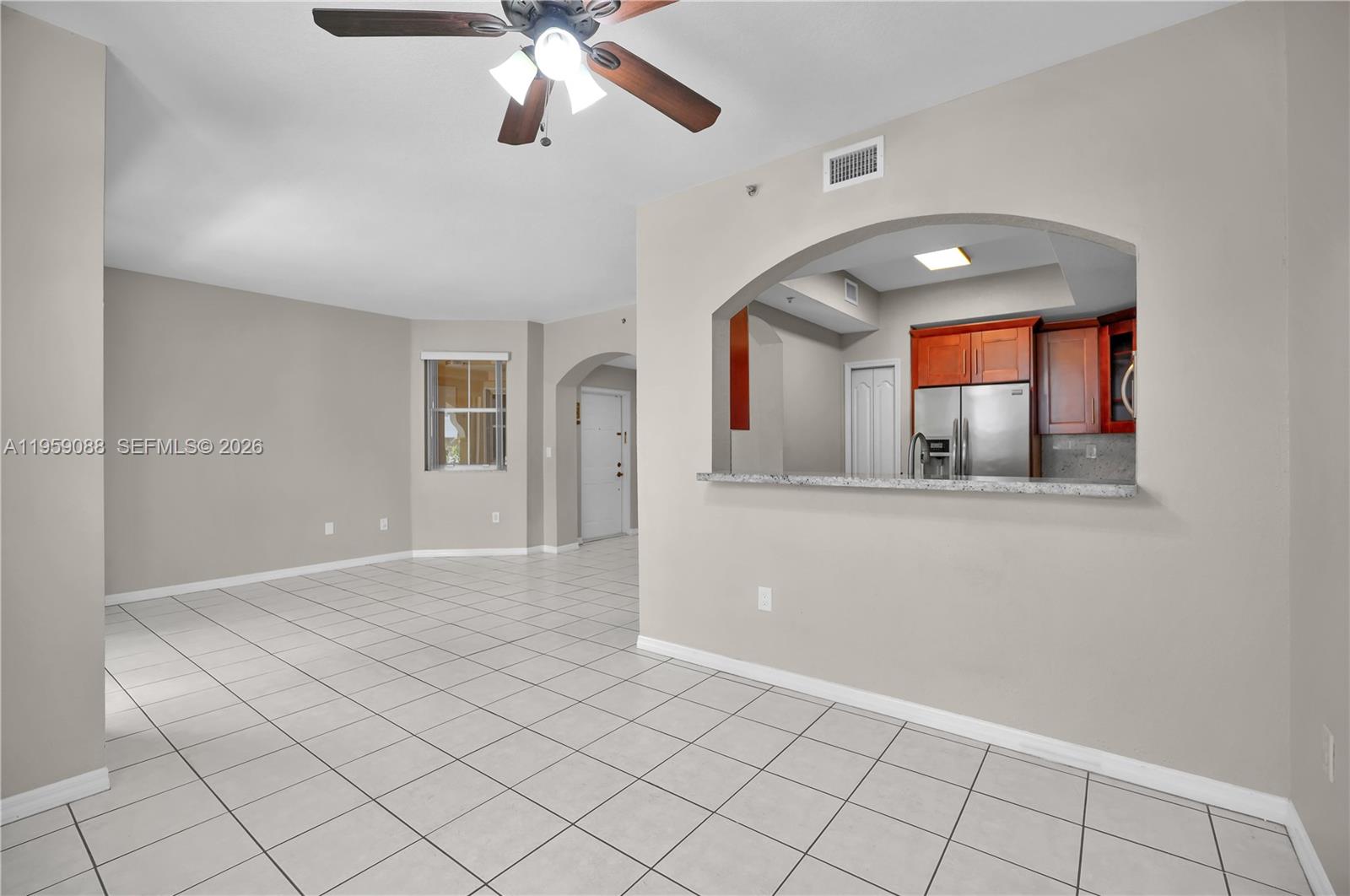 8964 West Flagler Street, Unit 109 Miami, FL 33174 - Photo 12 of 39 a view of a livingroom with a staircase
