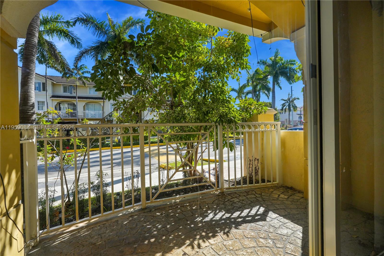 8964 West Flagler Street, Unit 109 Miami, FL 33174 - Photo 27 of 39 a view of a house with a tree in front