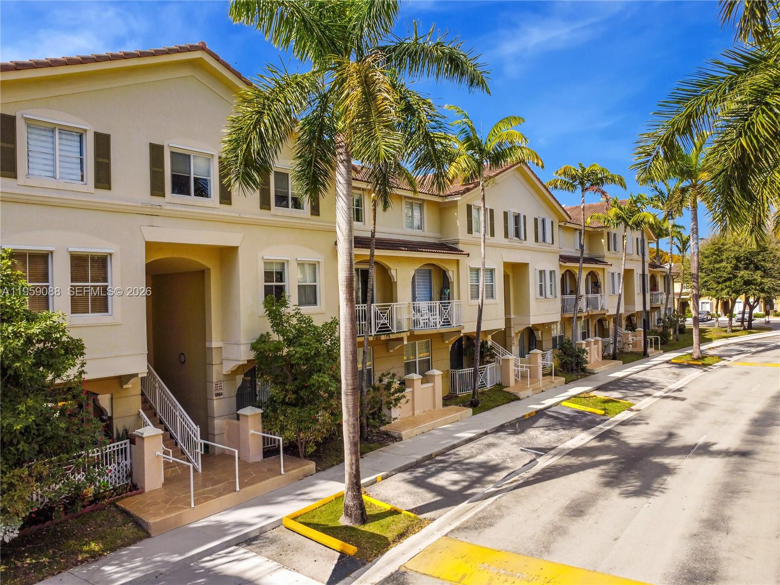 8964 West Flagler Street, Unit 109 Miami, FL 33174 - Photo 32 of 39 a view of a house with swimming pool and sitting area