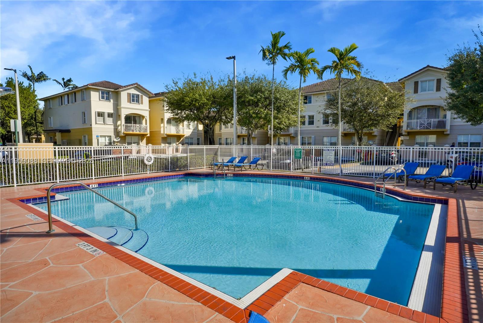 8964 West Flagler Street, Unit 109 Miami, FL 33174 - Photo 34 of 39 a view of a swimming pool with a patio