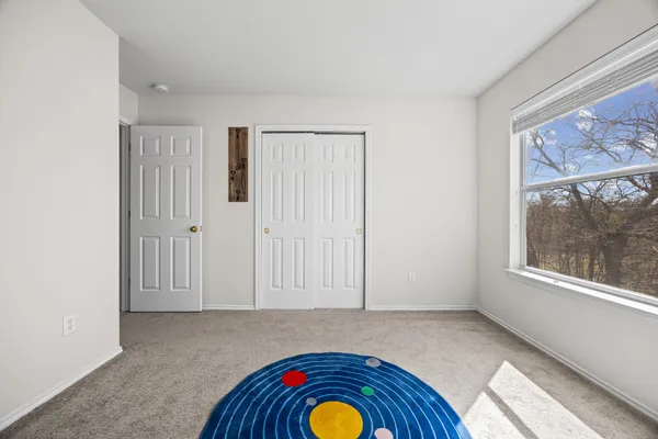 an empty room with windows
