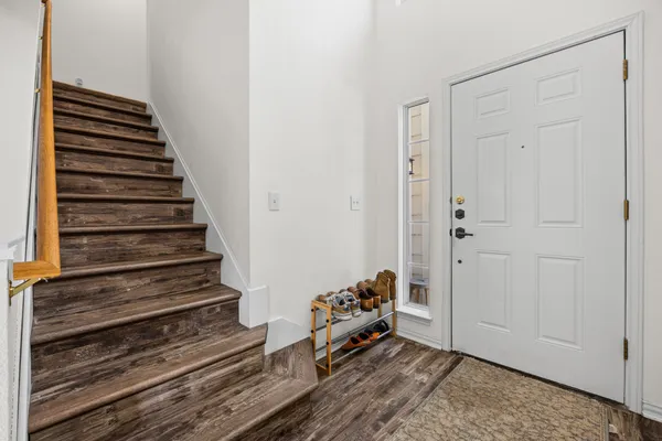 a view of an entryway with stairs