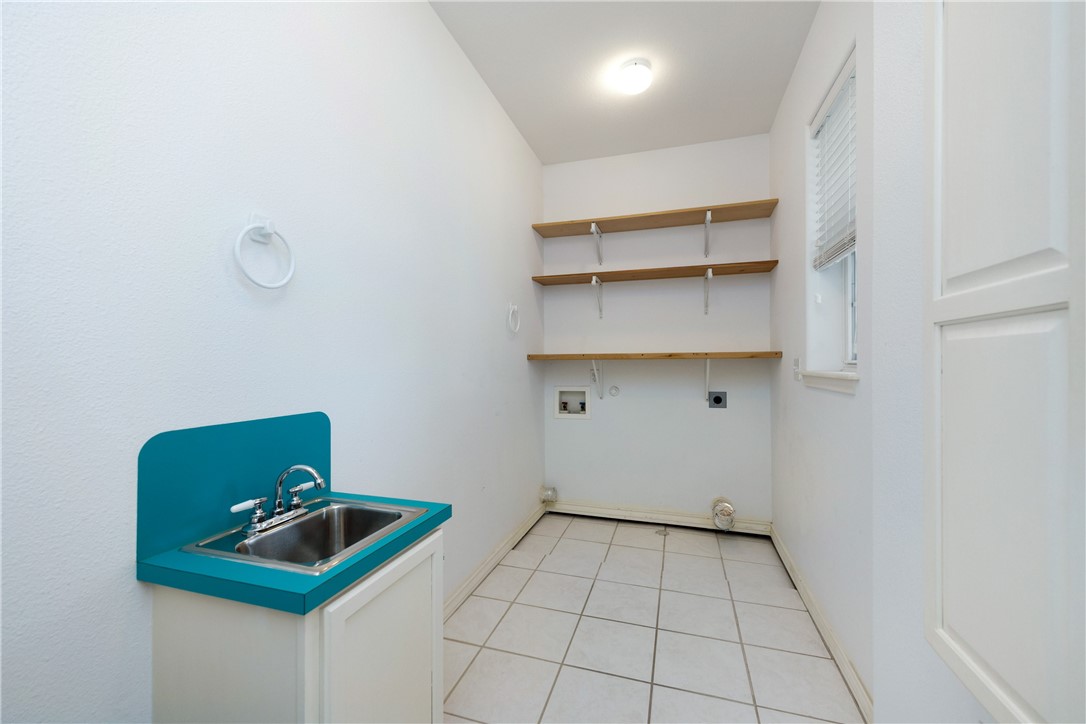 8101 Mt Zion Corpus Christi, TX 78413 - Photo 15 of 36 a room with cabinets and dust bin