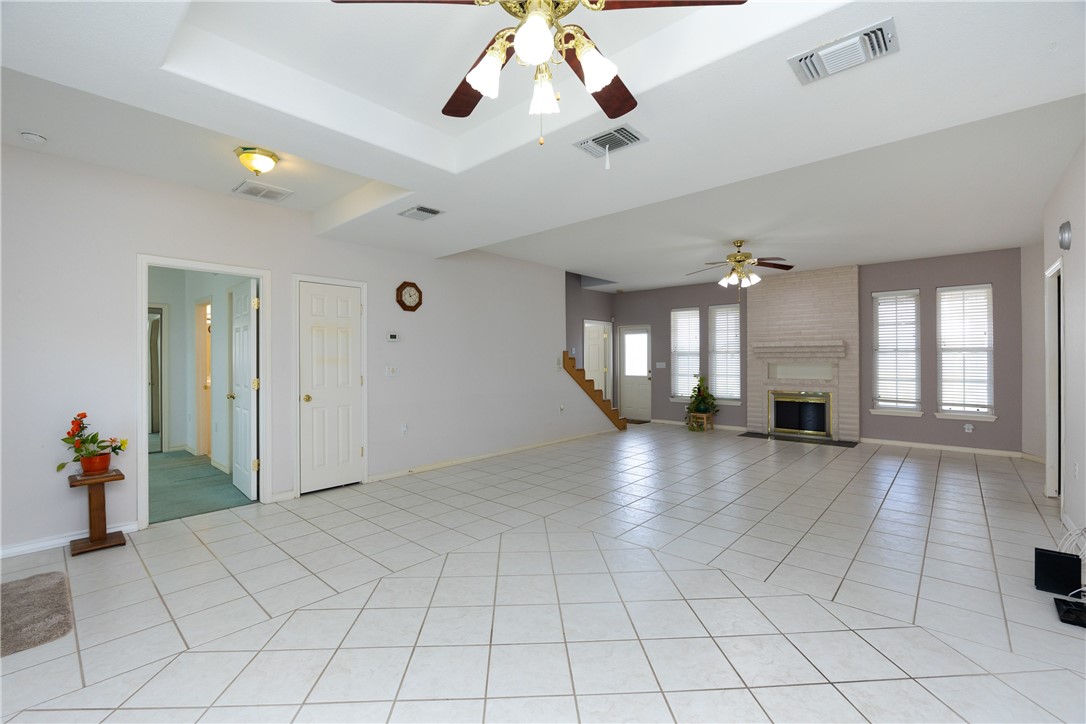 8101 Mt Zion Corpus Christi, TX 78413 - Photo 9 of 36 a view of an entryway with a chandelier fan and windows