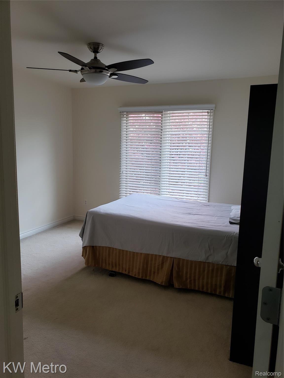 1227 Letica Drive Rochester, MI 48307 - Photo 34 of 58 2nd Floor Bedroom with Fan