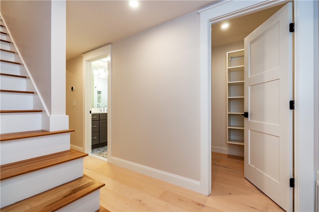 510 Greenbush Road Warwick, RI 02818 - Photo 38 of 49 Lower level hallway—-huge custom utility closet