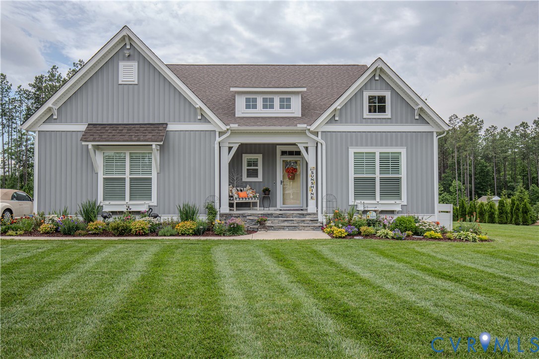 8406 Capernwray Drive Chesterfield, VA 23838 - Photo 1 of 47 a front view of a house with a yard