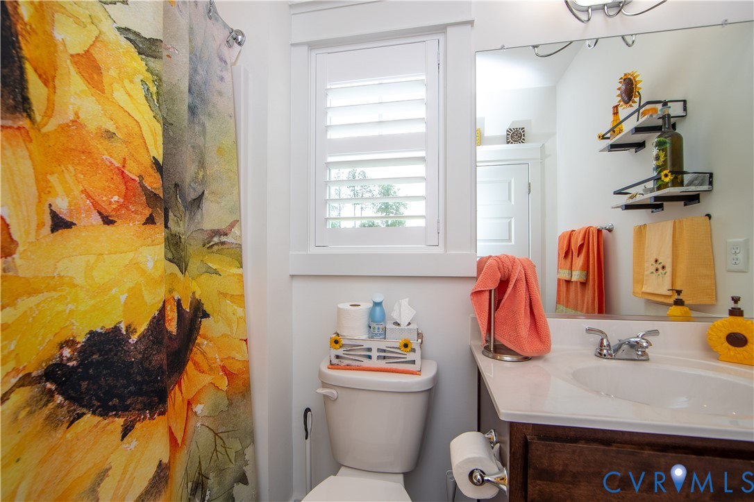 8406 Capernwray Drive Chesterfield, VA 23838 - Photo 15 of 47 a bathroom with a sink and a window