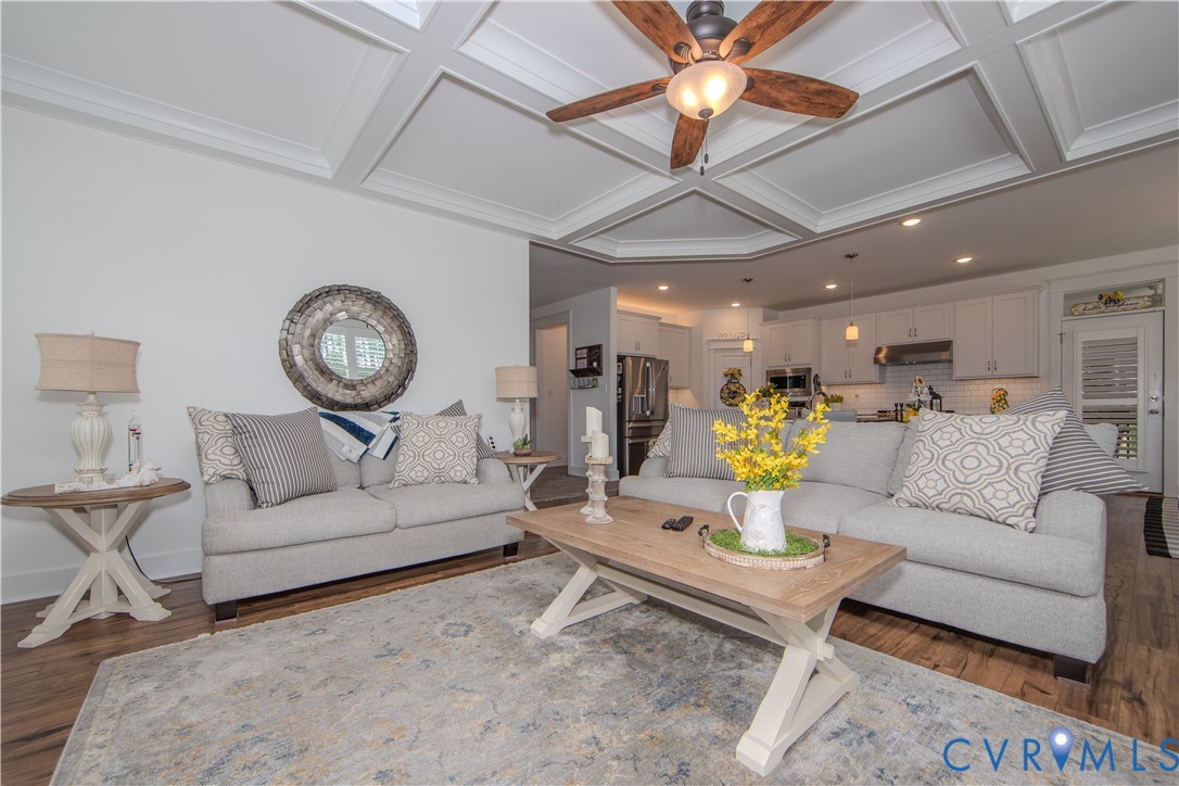 8406 Capernwray Drive Chesterfield, VA 23838 - Photo 33 of 47 a living room with furniture and a chandelier