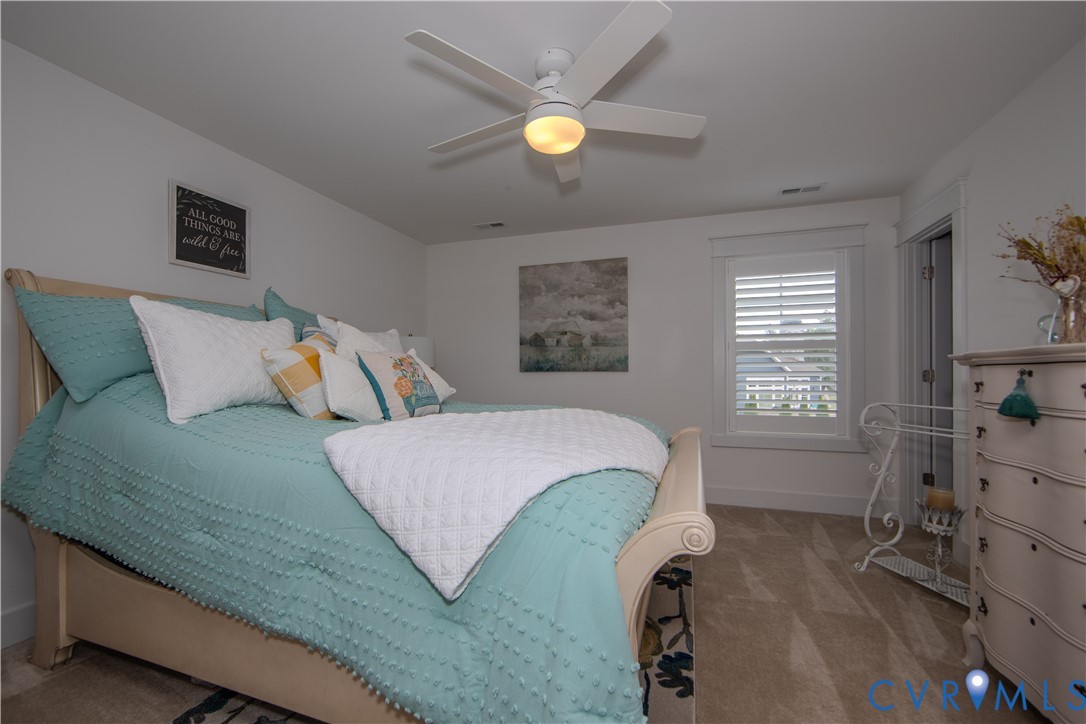 8406 Capernwray Drive Chesterfield, VA 23838 - Photo 39 of 47 a bedroom with a bed and window