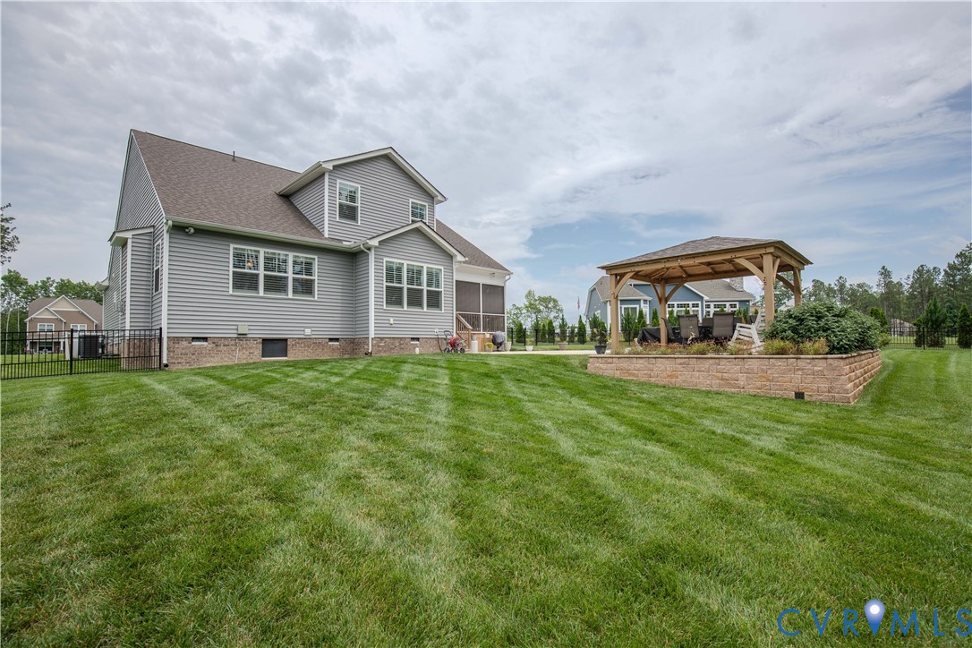 8406 Capernwray Drive Chesterfield, VA 23838 - Photo 10 of 47 a front view of house with yard and green space
