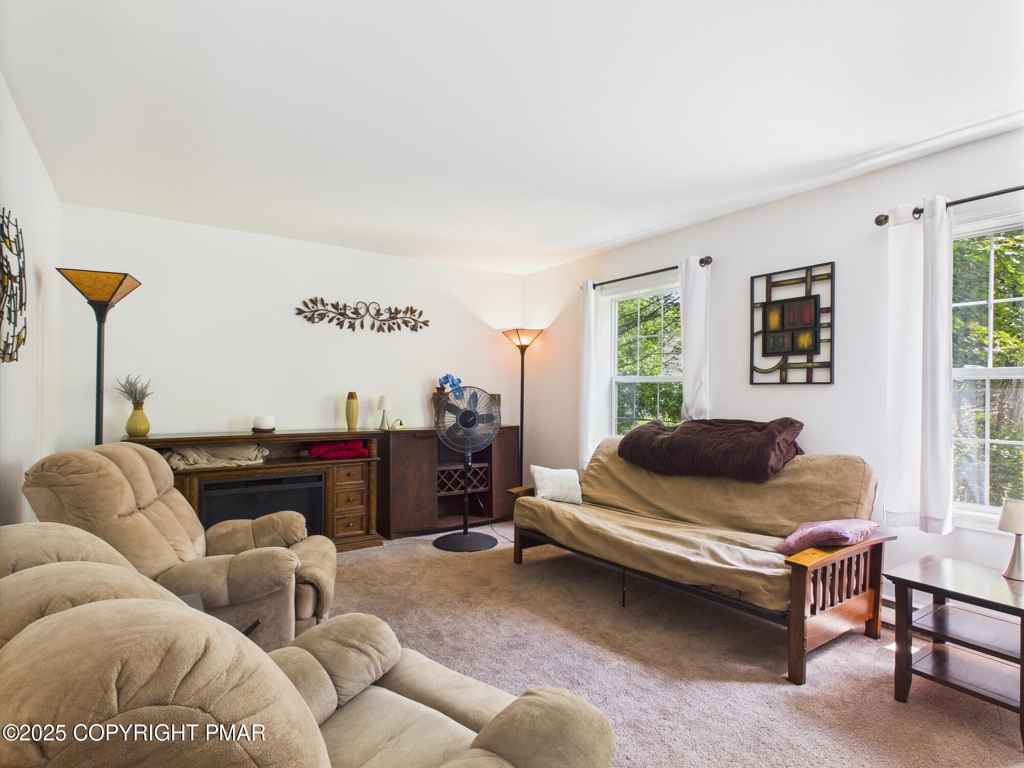 4155 Falcon Terrace Tobyhanna, PA 18466 - Photo 10 of 42 a living room with furniture and a window