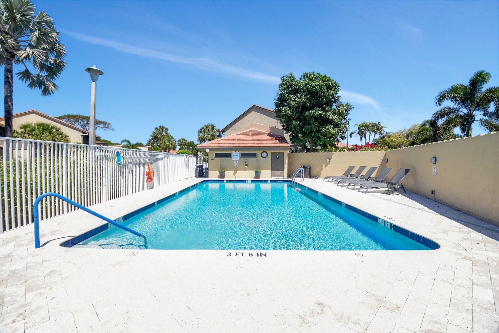 11067 Oakdale Road Boynton Beach, FL 33437 - Photo 24 of 31 a view of swimming pool with a yard