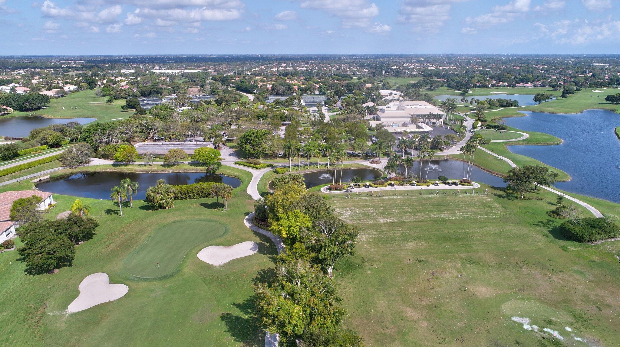 11067 Oakdale Road Boynton Beach, FL 33437 - Photo 26 of 31 an aerial view of residential houses with outdoor space and trees