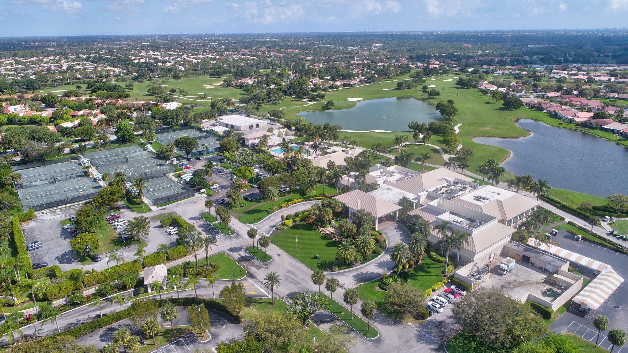 11067 Oakdale Road Boynton Beach, FL 33437 - Photo 27 of 31 an aerial view of a city with lots of residential buildings