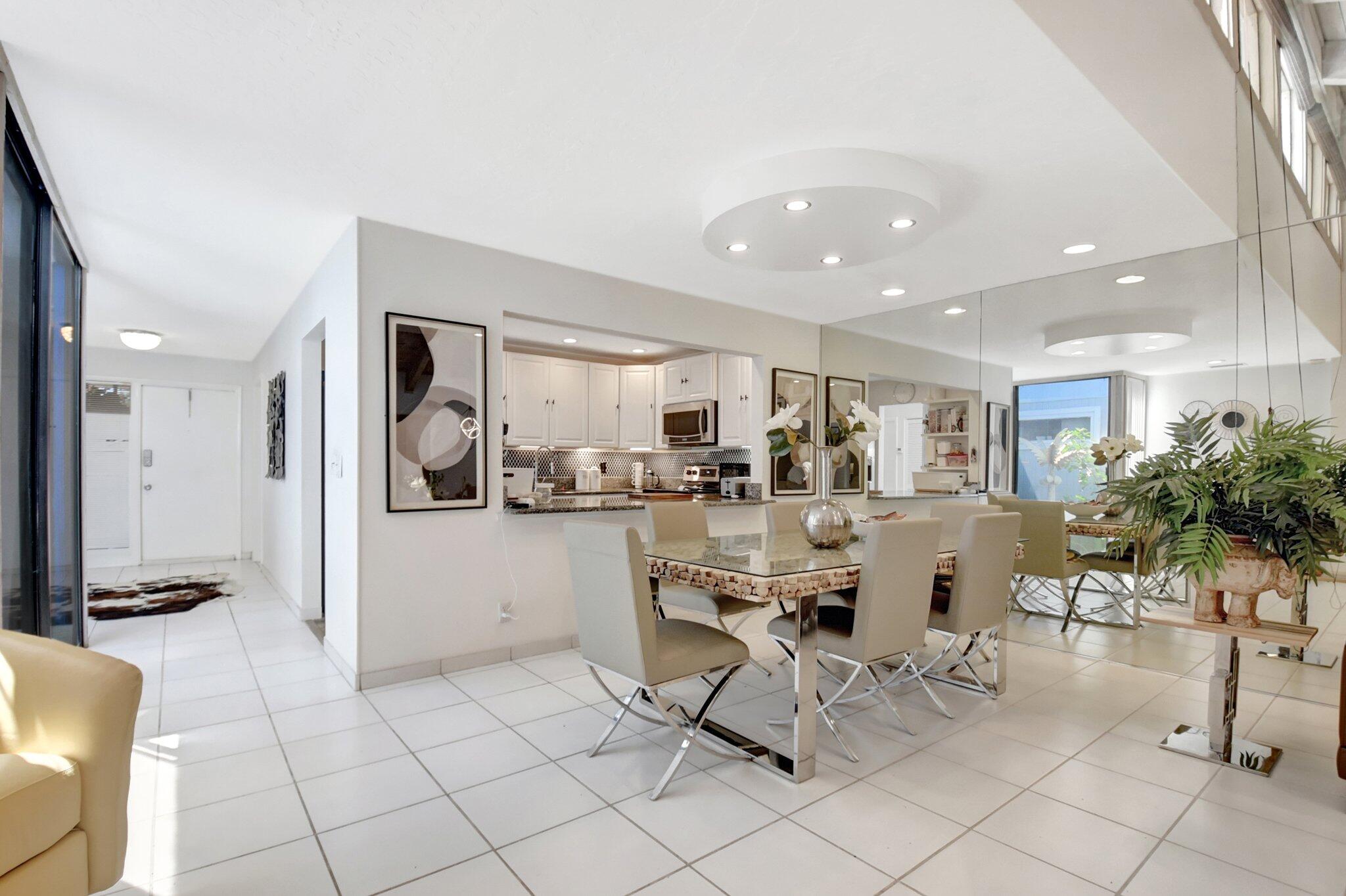 11067 Oakdale Road Boynton Beach, FL 33437 - Photo 6 of 31 a view of a dining area with furniture