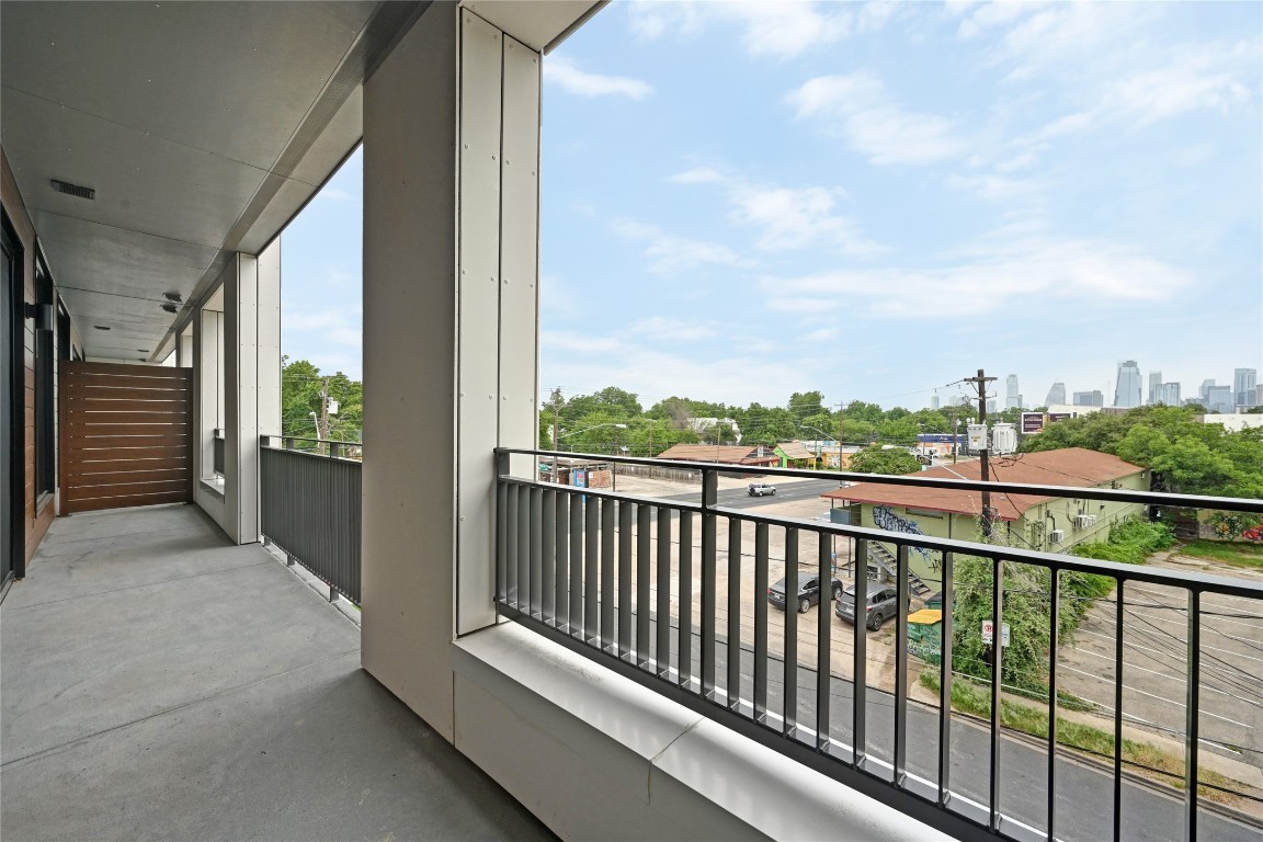 2209 South 1st Street, Unit 209 Austin, TX 78704 - Photo 9 of 33 a balcony with street view