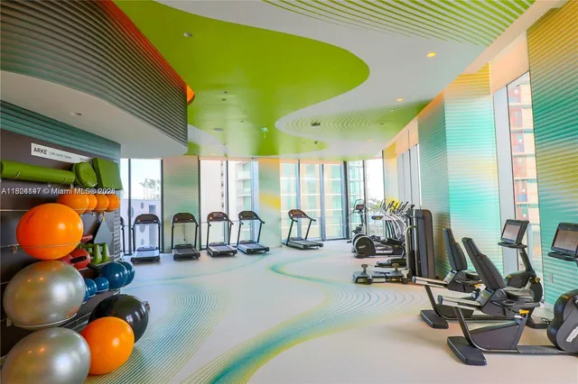 a spacious bathroom with a tub and shower