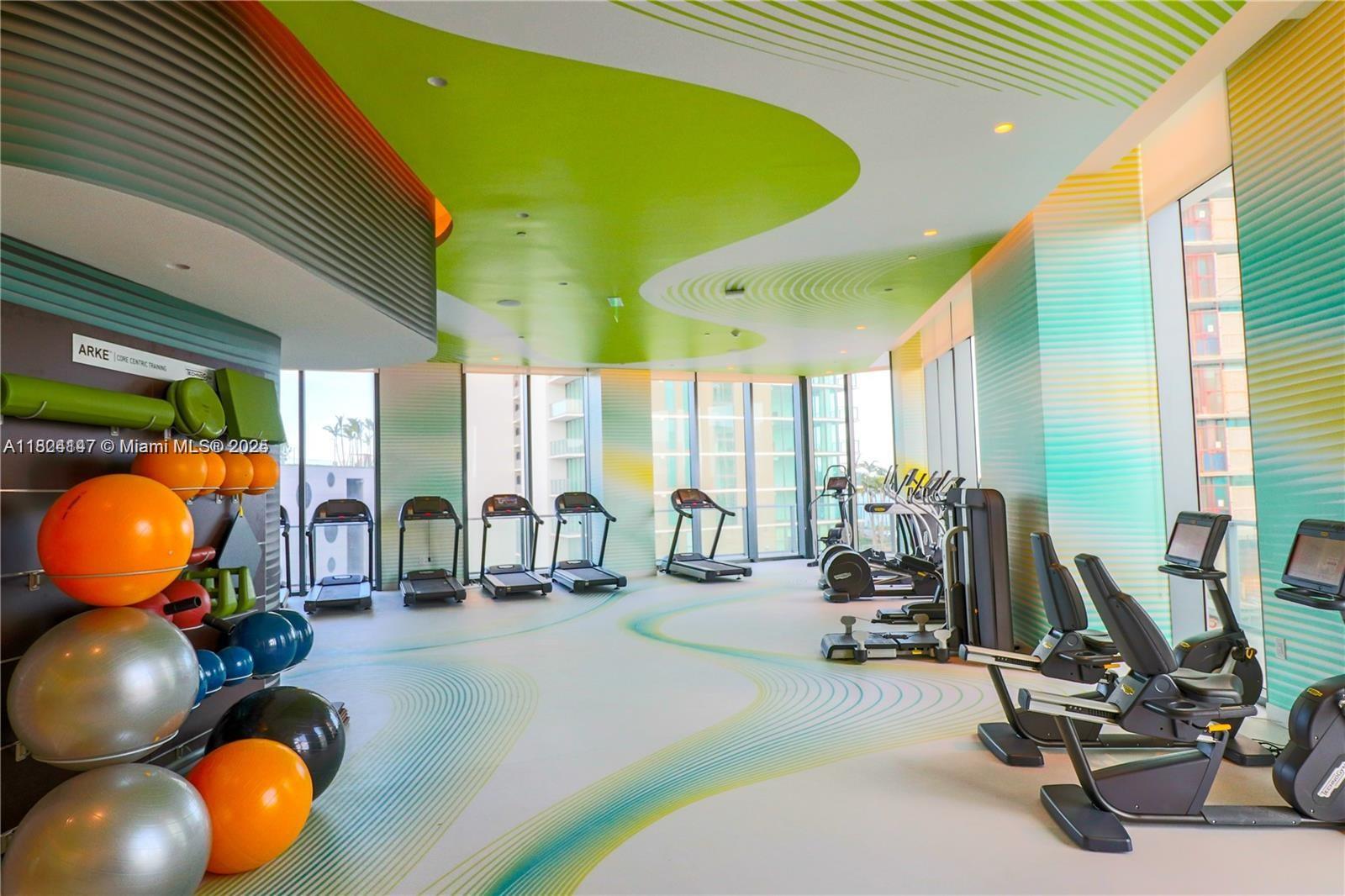 501 Northeast 31st Street, Unit 2005 Miami, FL 33137 - Photo 18 of 30 a room with gym equipment