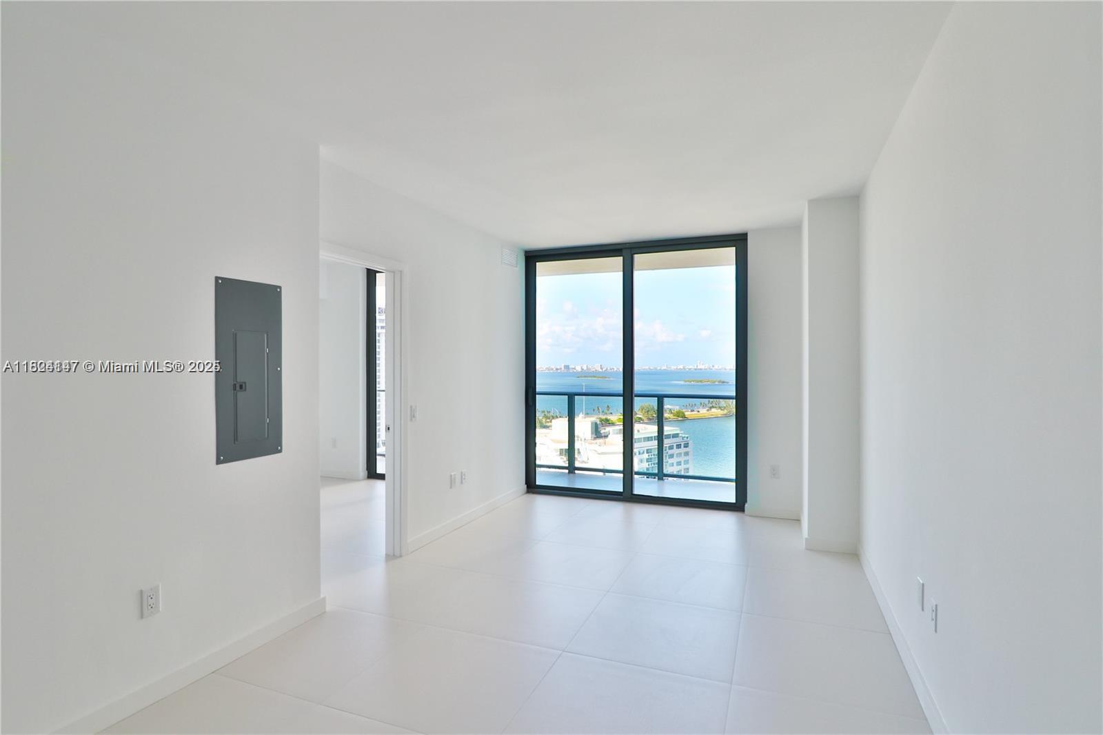 501 Northeast 31st Street, Unit 2005 Miami, FL 33137 - Photo 3 of 30 an empty room with windows and closet