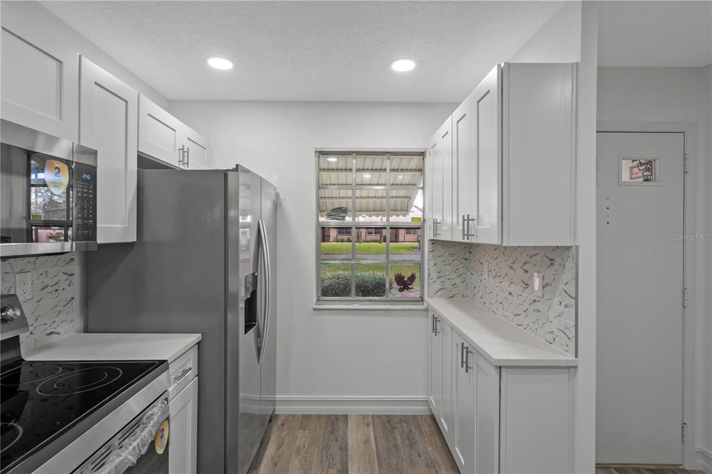 8310 High Point Circle, Unit 4 Port Richey, FL 34668 - Photo 6 of 35 Gallery Image 6
