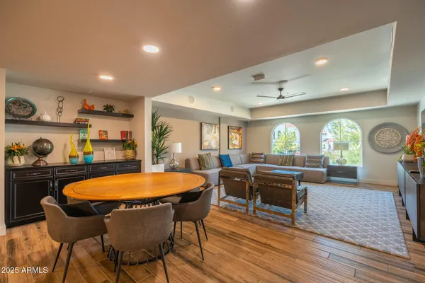 a view of a dining room with furniture window and wooden floor