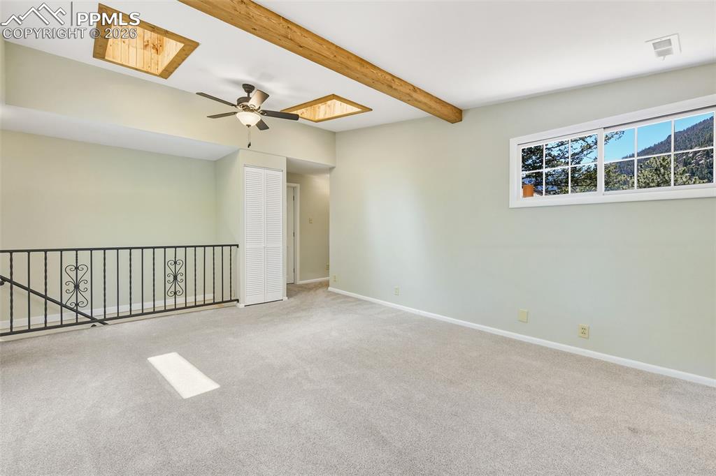 4530 Hagerman Road Cascade, CO 80809 - Photo 28 of 47 Upper Level Family Room With Mountain Views