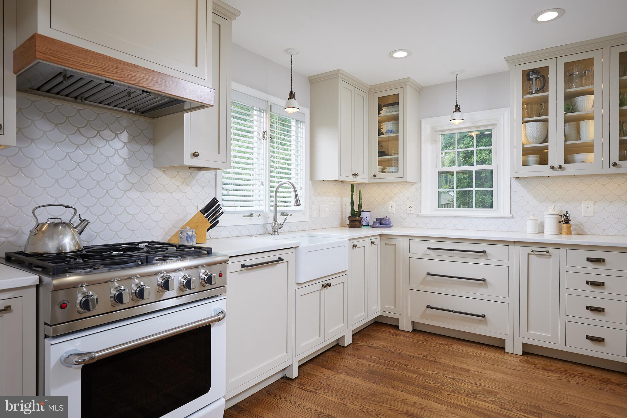 67 Eldrid Drive Silver Spring, MD 20904 - Photo 3 of 51 a kitchen with cabinets appliances and a window
