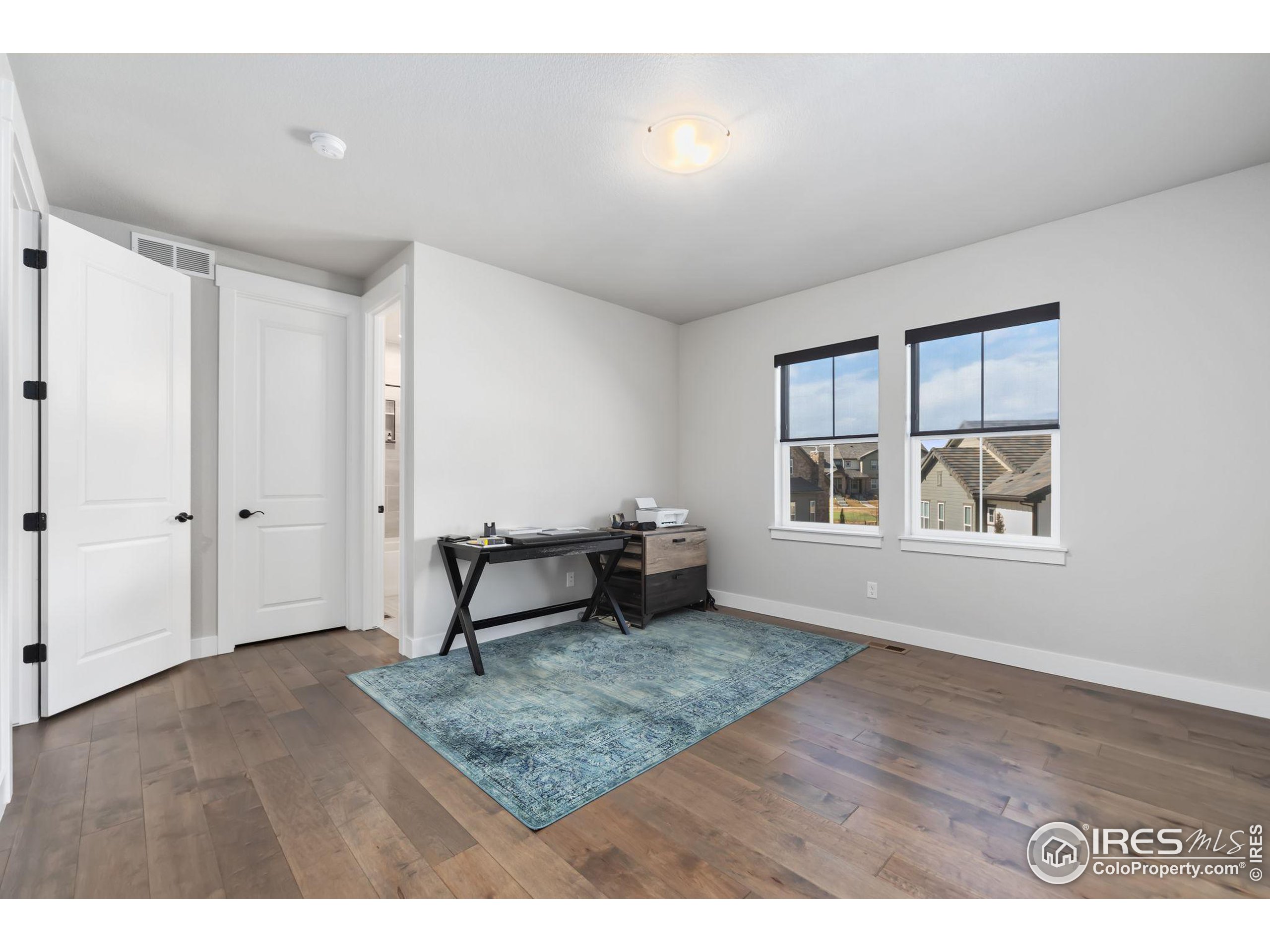 2748 Prairie Flax Street Berthoud, CO 80513 - Photo 20 of 40 a view of an empty room