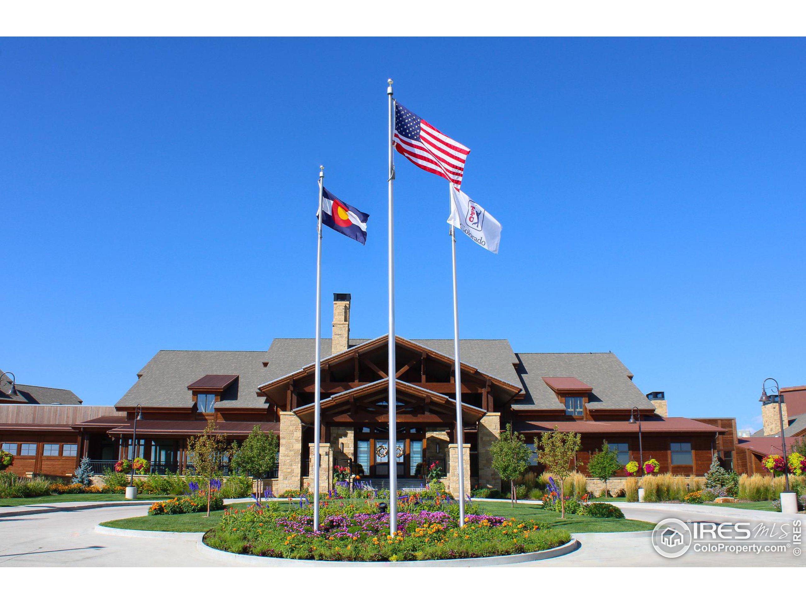 2748 Prairie Flax Street Berthoud, CO 80513 - Photo 32 of 40 a front view of a house with a yard