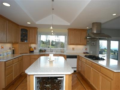 4820 Pressley Road Santa Rosa, CA 95404 - Photo 6 of 9 a kitchen with a sink a counter space appliances and cabinets