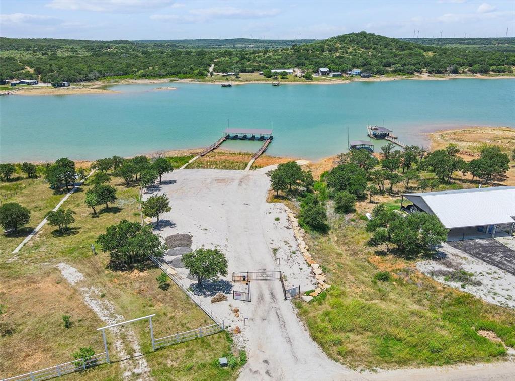 141 Scenic Ridge Drive Cisco, TX 76437 - Photo 6 of 9 an aerial view of ocean residential house with outdoor space and seating