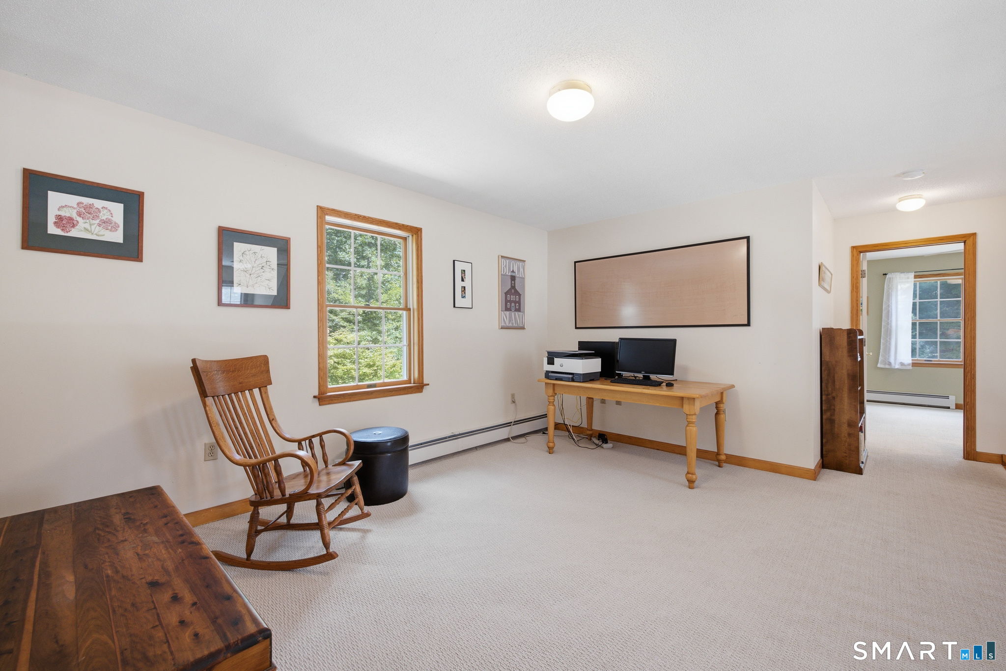 24 Liska Road Willington, CT 06279 - Photo 17 of 40 The loft on the upper level is open to the living room below. The loft is currently used as an office.