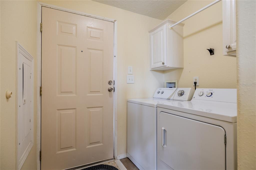 126 Charles Street Edgewater, FL 32141 - Photo 35 of 40 a utility room with dryer and washer
