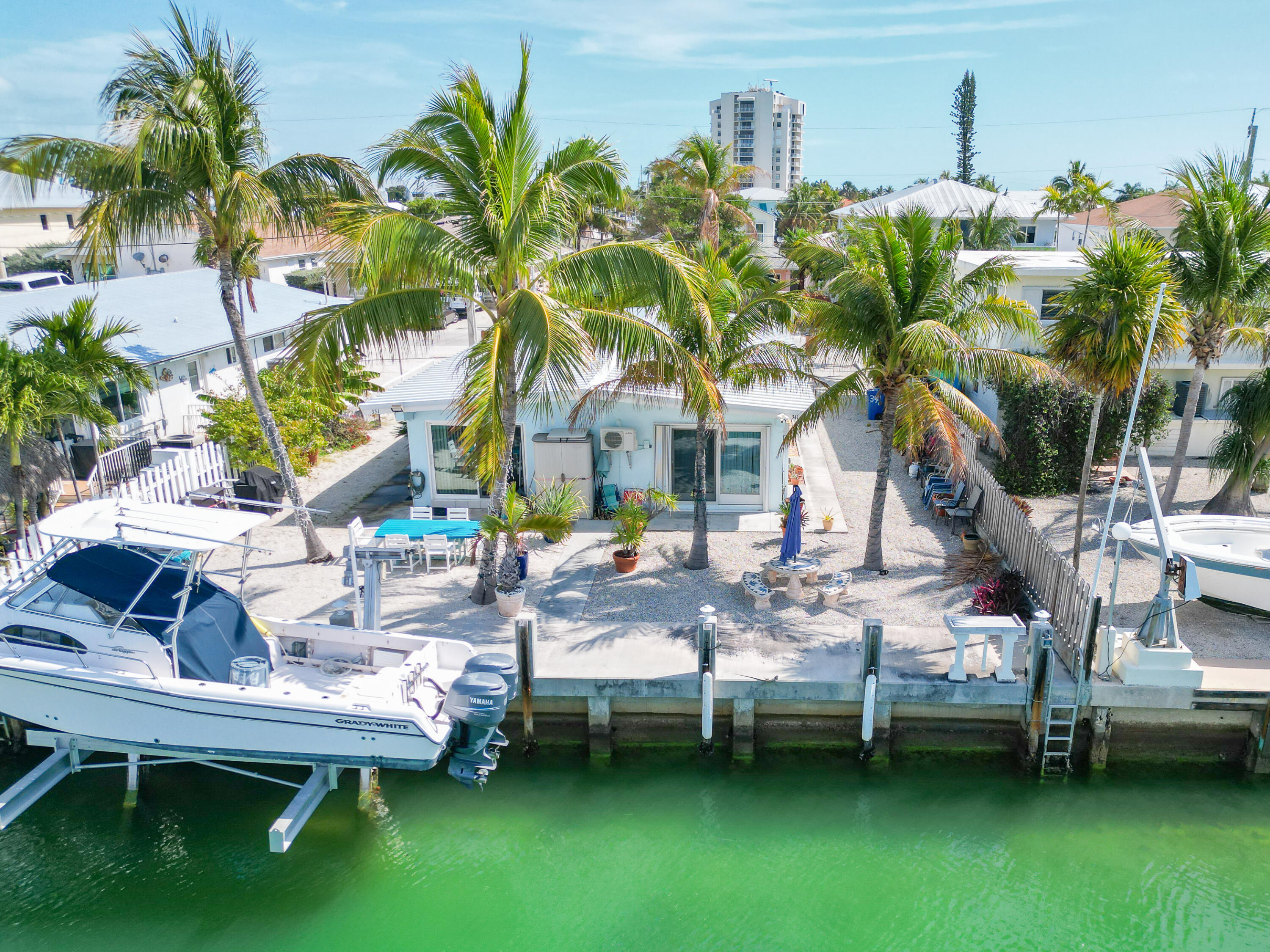 341 3rd Street Key Colony Beach, FL 33051 - Photo 14 of 42 a view of yard with swimming pool