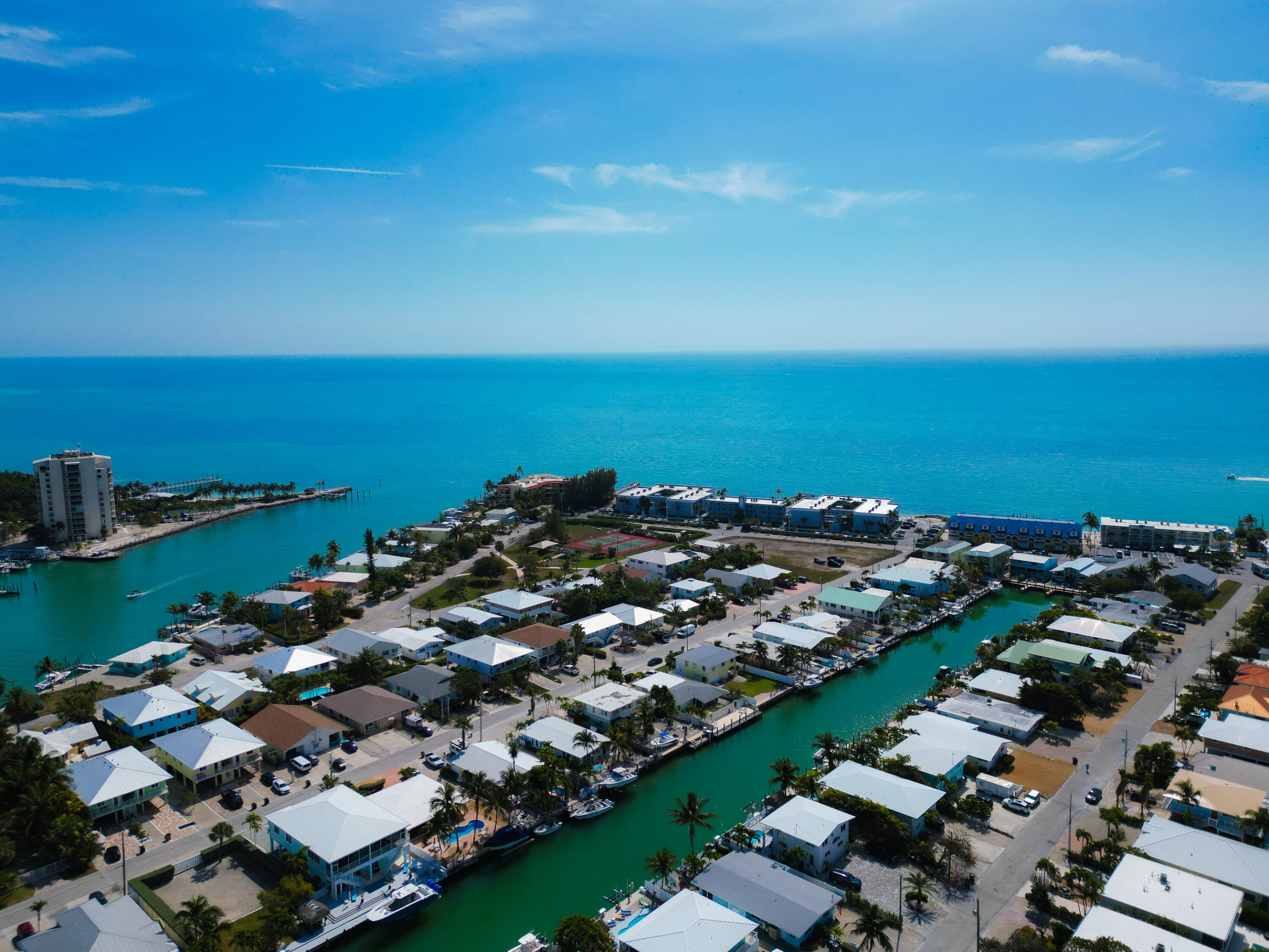 341 3rd Street Key Colony Beach, FL 33051 - Photo 15 of 42 an aerial view of a city with ocean view in back