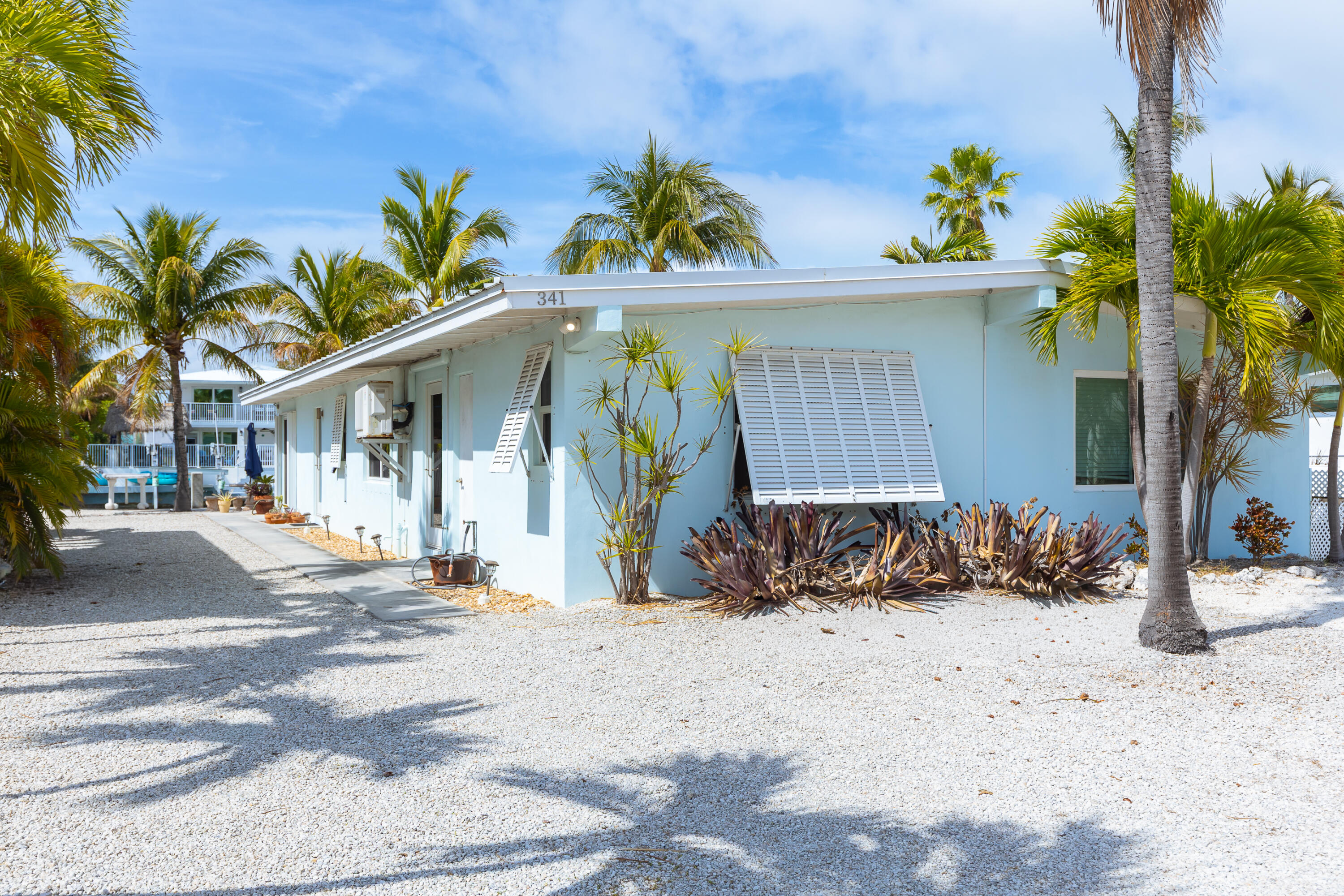 341 3rd Street Key Colony Beach, FL 33051 - Photo 24 of 42 a view of a house with a snow on the road