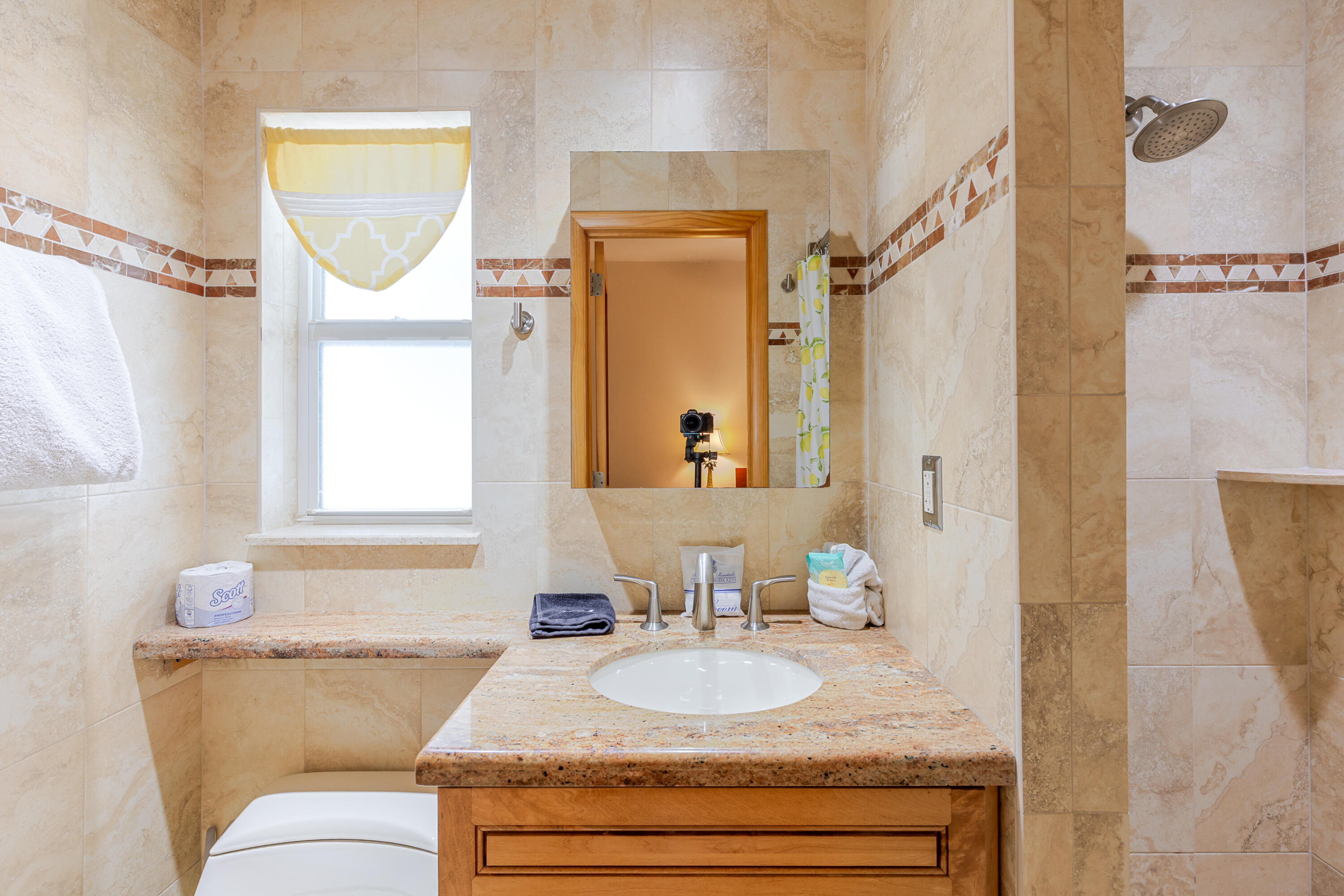 341 3rd Street Key Colony Beach, FL 33051 - Photo 35 of 42 a bathroom with a granite countertop sink and a mirror