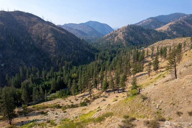 a view of a house with a mountain