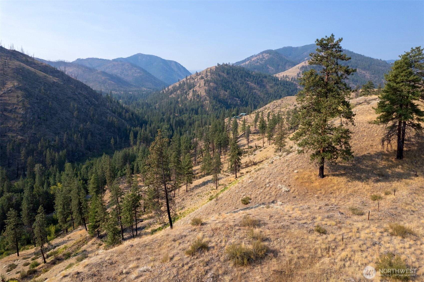 88-tbd Gold Creek Road Carlton, WA 98814 - Photo 20 of 39 a view of a house with a yard