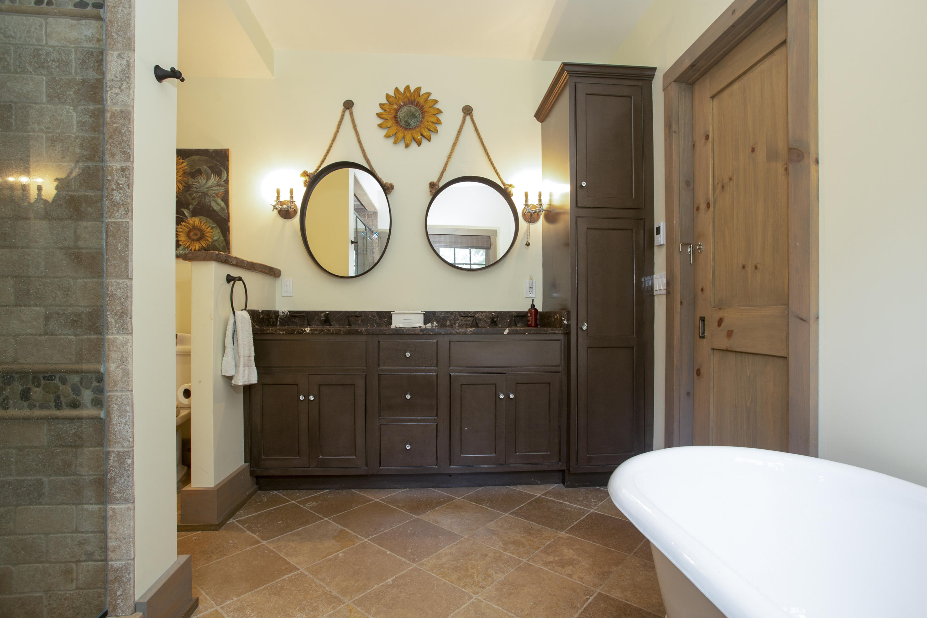 494 June Road Stamford, CT 06831 - Photo 23 of 47 a bathroom with a sink and a mirror