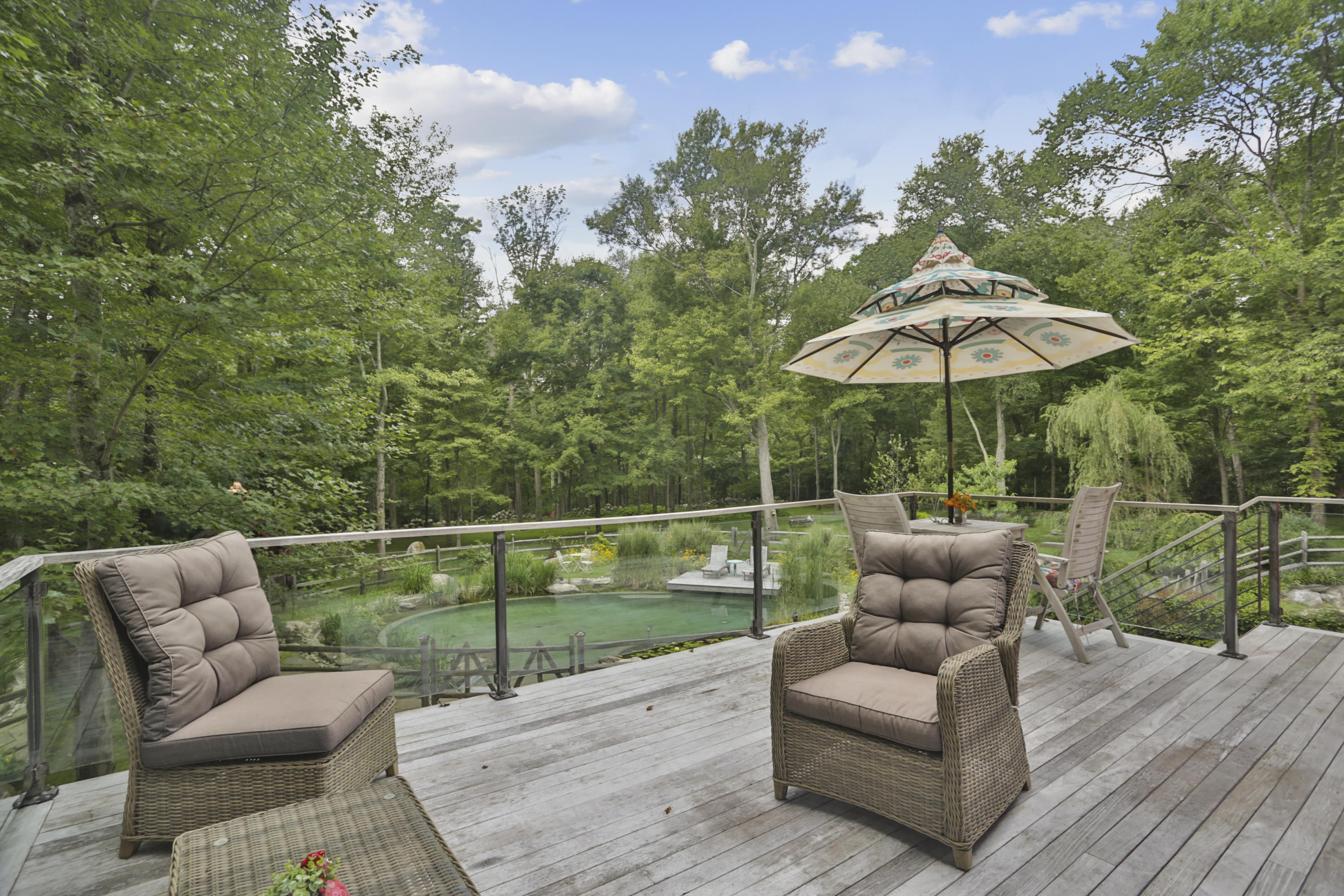 494 June Road Stamford, CT 06831 - Photo 36 of 47 a patio with patio a couch and chairs