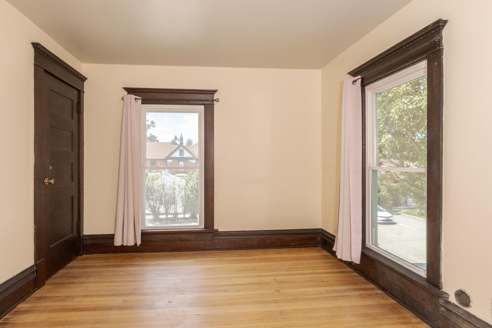 409 West Water Street Pontiac, IL 61764 - Photo 39 of 55 a view of an empty room with wooden floor and a window