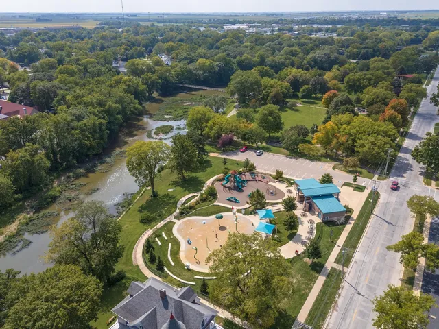 a view of a swimming pool with a yard