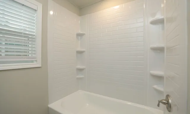 a bathroom with a bathtub