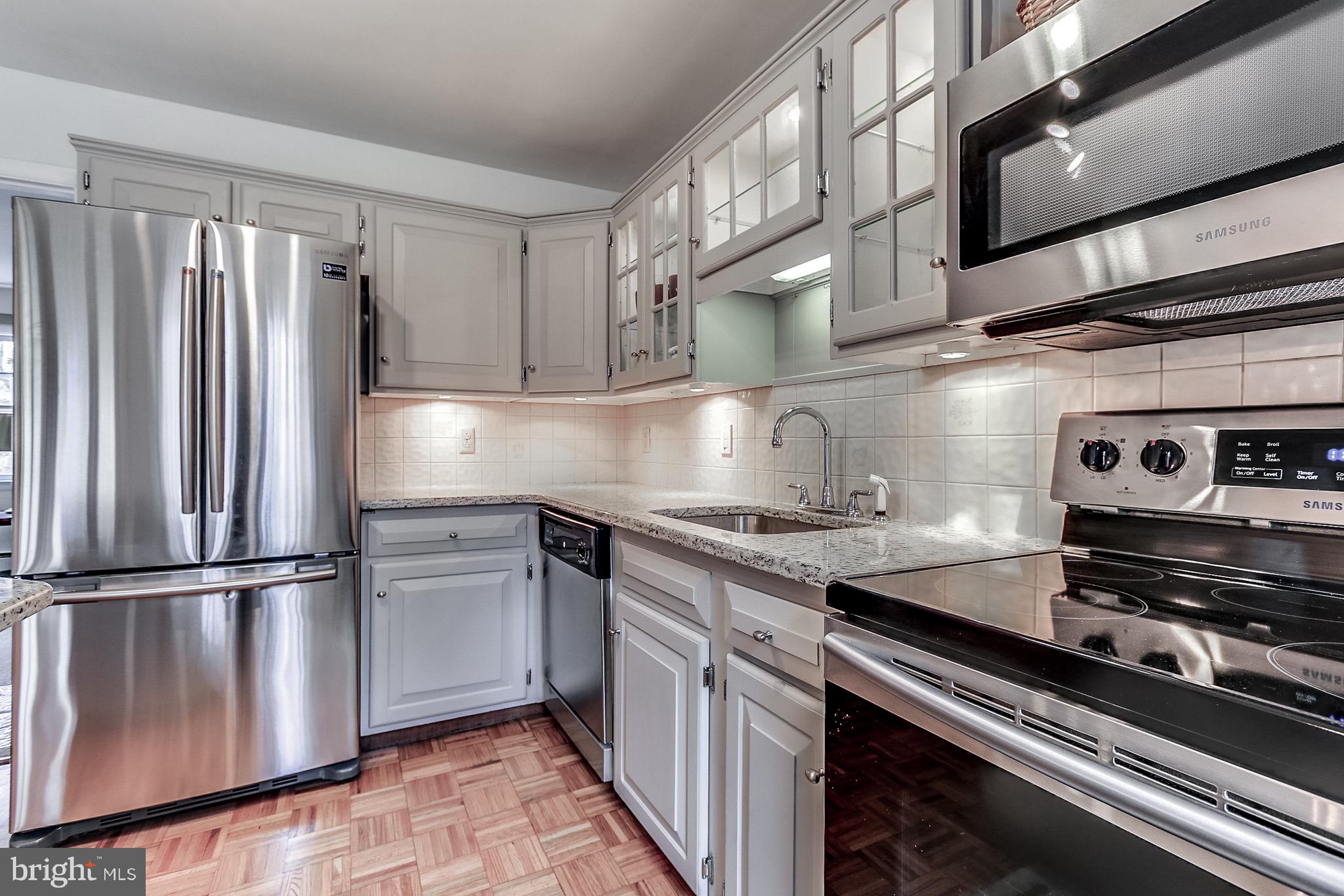 182 Good Hope Road Landenberg, PA 19350 - Photo 6 of 25 Grey/Glass Cabinetry & Undercabinet Lighting