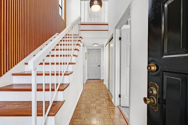 a view of a balcony with staircase